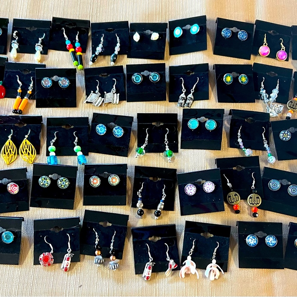 This is a lot of 25 handmade pierced earrings- For Resale or for own purposes.